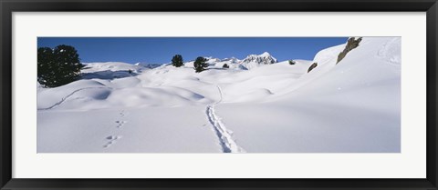 Framed Footprints on a snow covered landscape, Alps, Riederalp, Valais Canton, Switzerland Print