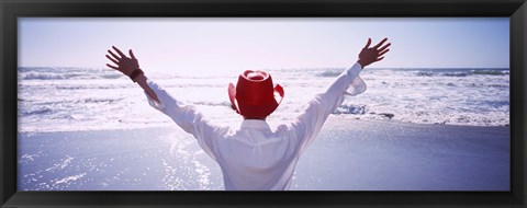 Framed Woman With Outstretched Arms On Beach, California, USA Print