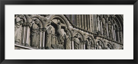 Framed Low angle view of statues carved on wall of a cathedral, Trondheim, Norway Print
