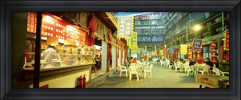 Framed Group of people sitting outside a restaurant, Beijing, China Print