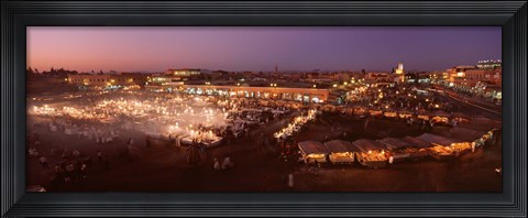 Framed High angle view of a market lit up at dusk, Djemaa El Fna, Medina Quarter, Marrakesh, Morocco Print