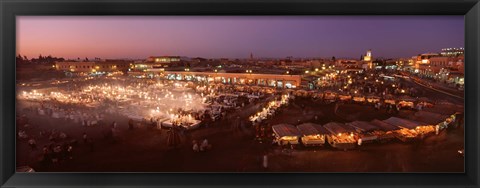 Framed High angle view of a market lit up at dusk, Djemaa El Fna, Medina Quarter, Marrakesh, Morocco Print