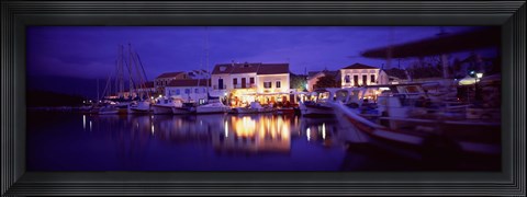 Framed Greece, Cephalonia, Light illuminated on harbor and outdoors cafe Print