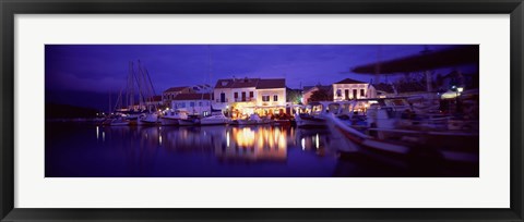 Framed Greece, Cephalonia, Light illuminated on harbor and outdoors cafe Print