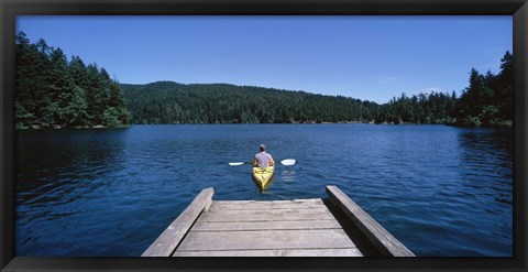 Framed Rear view of a man on a kayak in a river, Orcas Island, Washington State, USA Print