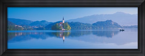 Framed Reflection of mountains and buildings in water, Lake Bled, Slovenia Print