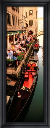 Framed Gondolas moored outside of a cafe, Venice, Italy Print