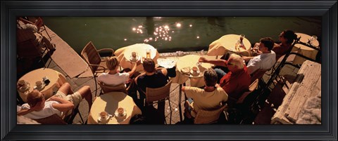 Framed High angle view of tourists sitting along a canal, Venice, Italy Print