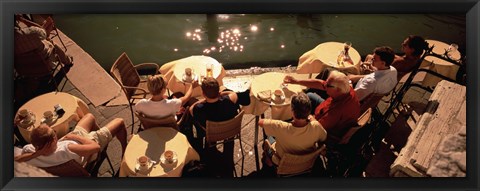 Framed High angle view of tourists sitting along a canal, Venice, Italy Print