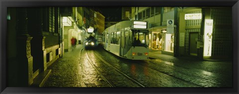 Framed Cable Cars Moving On A Street, Freiburg, Germany Print