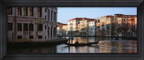 Framed Man on a gondola in a canal, Grand Canal, Venice, Italy Print