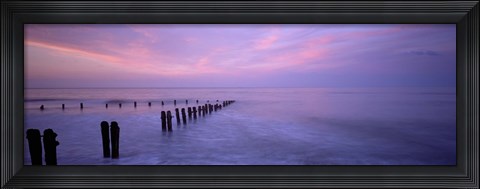 Framed Wooden Posts In Water, Sandsend, Yorkshire, England, United Kingdom Print