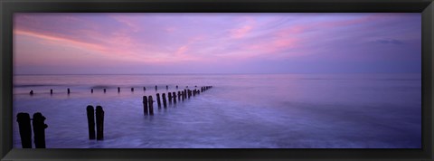 Framed Wooden Posts In Water, Sandsend, Yorkshire, England, United Kingdom Print