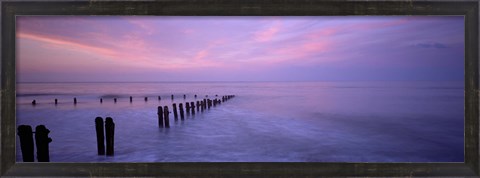 Framed Wooden Posts In Water, Sandsend, Yorkshire, England, United Kingdom Print