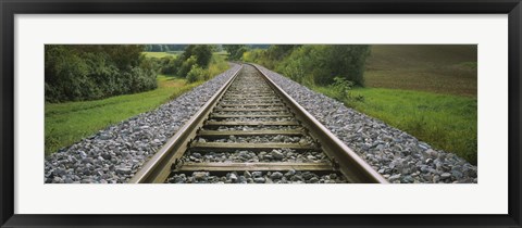 Framed Railroad track passing through a landscape, Germany Print