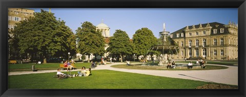 Framed Group Of People Sitting Around A Fountain In A Park, Schlossplatz, Stuttgart, Baden-Wurttemberg, Germany Print