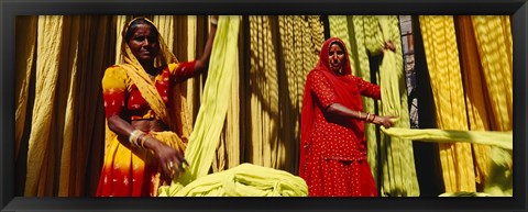 Framed Portrait of two mature women working in a textile industry, Rajasthan, India Print