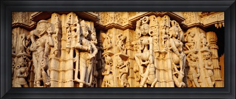Framed Sculptures carved on a wall of a temple, Jain Temple, Ranakpur, Rajasthan, India Print