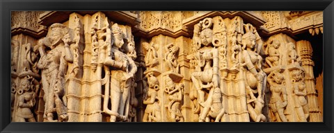 Framed Sculptures carved on a wall of a temple, Jain Temple, Ranakpur, Rajasthan, India Print