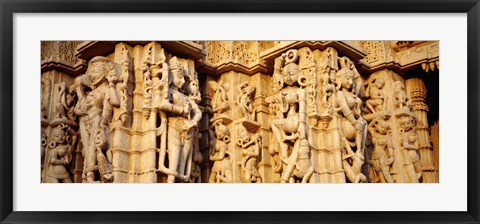 Framed Sculptures carved on a wall of a temple, Jain Temple, Ranakpur, Rajasthan, India Print