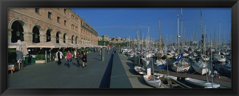 Framed Pedestrian walkway along a harbor, Barcelona, Catalonia, Spain Print