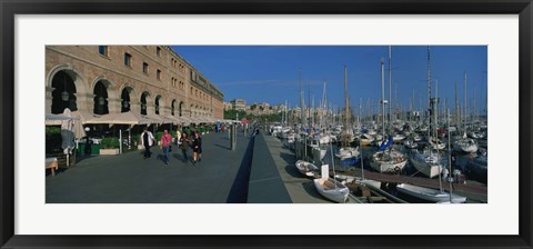 Framed Pedestrian walkway along a harbor, Barcelona, Catalonia, Spain Print