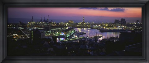 Framed High angle view of city at a port lit up at dusk, Genoa, Liguria, Italy Print