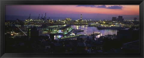 Framed High angle view of city at a port lit up at dusk, Genoa, Liguria, Italy Print