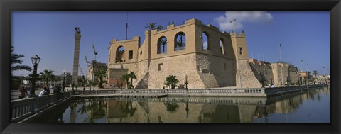 Framed Reflection of a building in a pond, Assai Al-Hamra, Tripoli, Libya Print