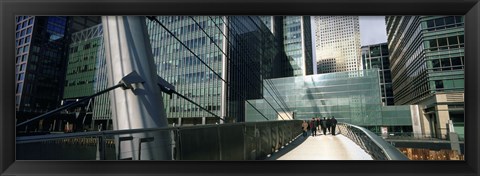 Framed Bridge in front of buildings, Canary Wharf, London, England Print