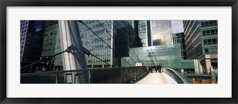 Framed Bridge in front of buildings, Canary Wharf, London, England Print