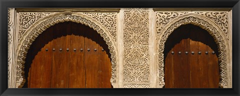 Framed Low angle view of carving on arches of a palace, Court Of Lions, Alhambra, Granada, Andalusia, Spain Print