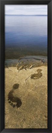 Framed High angle view of wet footprints on a rock, Lake Pielinen, Lieksa, Finland Print