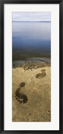 Framed High angle view of wet footprints on a rock, Lake Pielinen, Lieksa, Finland Print