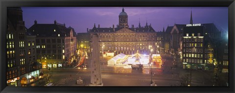 Framed High angle view of a town square lit up at dusk, Dam Square, Amsterdam, Netherlands Print