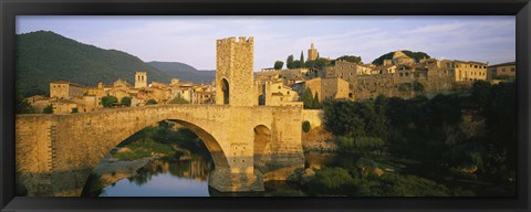 Framed Arch bridge across a river in front of a city, Besalu, Catalonia, Spain Print