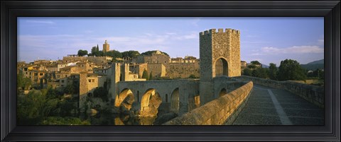 Framed Footbridge across a river in front of a city, Besalu, Catalonia, Spain Print