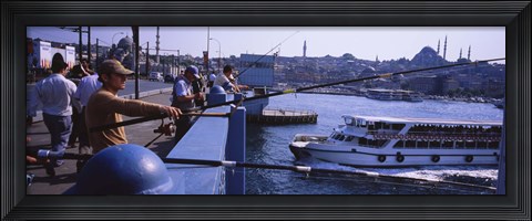 Framed Side profile of fishermen fishing in a river, Galata Bridge, Istanbul, Turkey Print