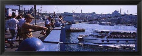 Framed Side profile of fishermen fishing in a river, Galata Bridge, Istanbul, Turkey Print