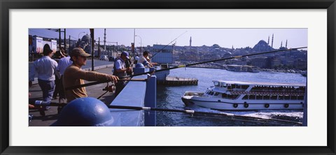 Framed Side profile of fishermen fishing in a river, Galata Bridge, Istanbul, Turkey Print