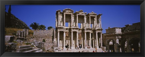 Framed Tourists in front of the old ruins of a library, Library At Epheses, Ephesus, Turkey Print