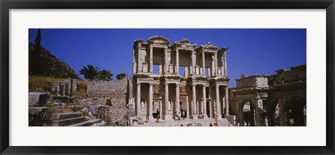 Framed Tourists in front of the old ruins of a library, Library At Epheses, Ephesus, Turkey Print