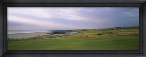 Framed Golf flag on a golf course, Royal Porthcawl Golf Club, Porthcawl, Wales Print