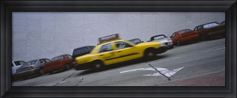 Framed Taxi running on the road, San Francisco, California, USA Print