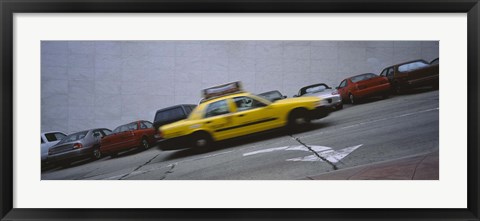 Framed Taxi running on the road, San Francisco, California, USA Print