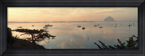 Framed Boats in a bay with Morro Rock in the distance, Morro Bay, San Luis Obispo, California, USA Print