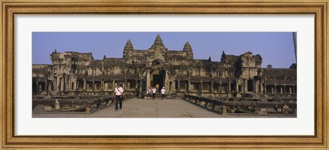 Framed Tourists walking in front of an old temple, Angkor Wat, Siem Reap, Cambodia Print