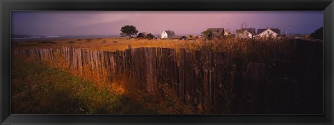 Framed Wooden fence in a field with houses in the background, Mendocino, California, USA Print