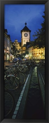 Framed Bicycles parked along a stream near a road, Freiburg, Baden-Wurttemberg, Germany Print