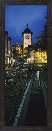 Framed Bicycles parked along a stream near a road, Freiburg, Baden-Wurttemberg, Germany Print